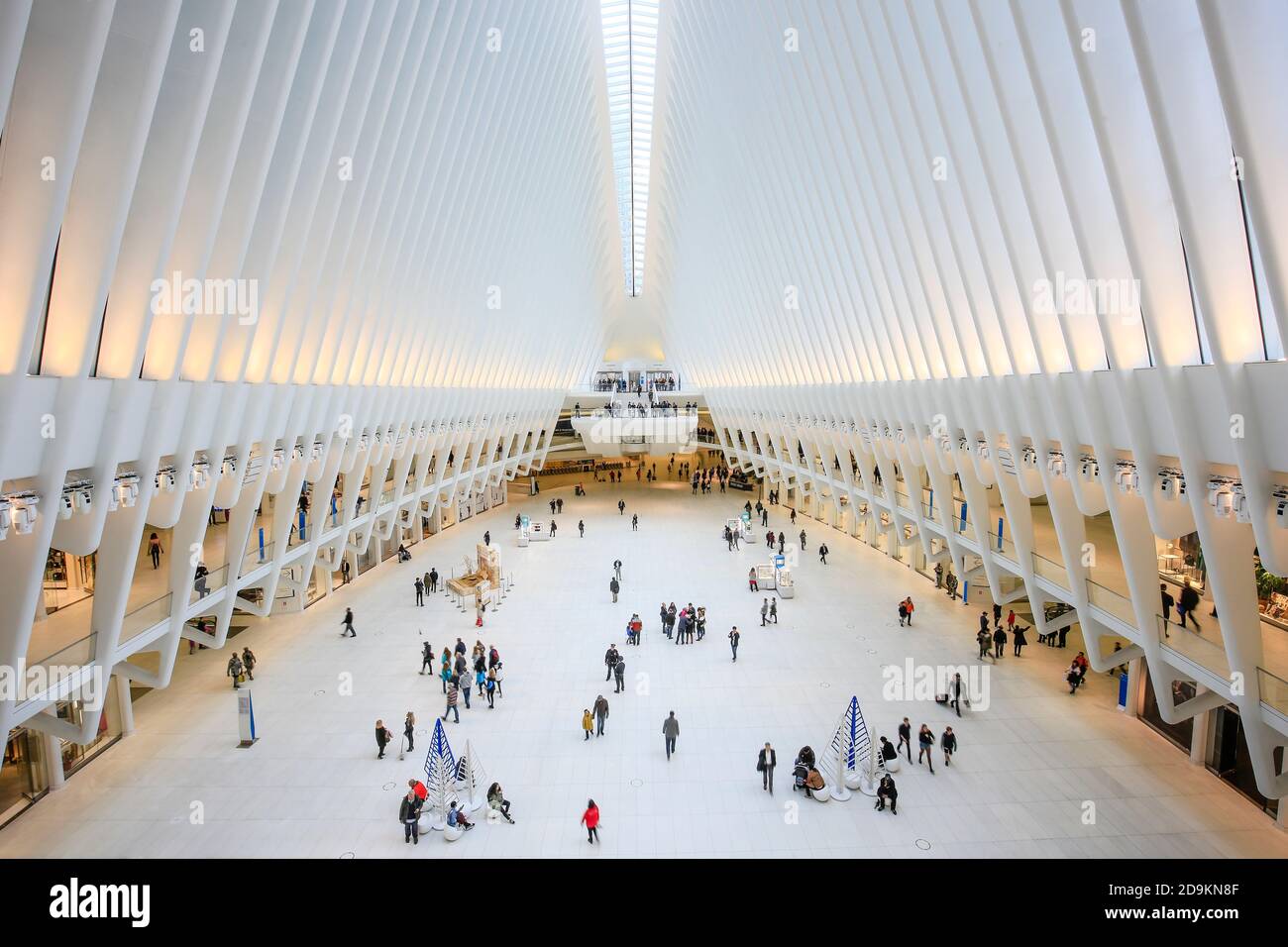 New York City, New York, United States of America - People in the Oculus, main hall of the subway station with shopping center, World Trade Center, Transportation Hub, WTC, architect Santiago Calatrava, Manhattan. Stock Photo