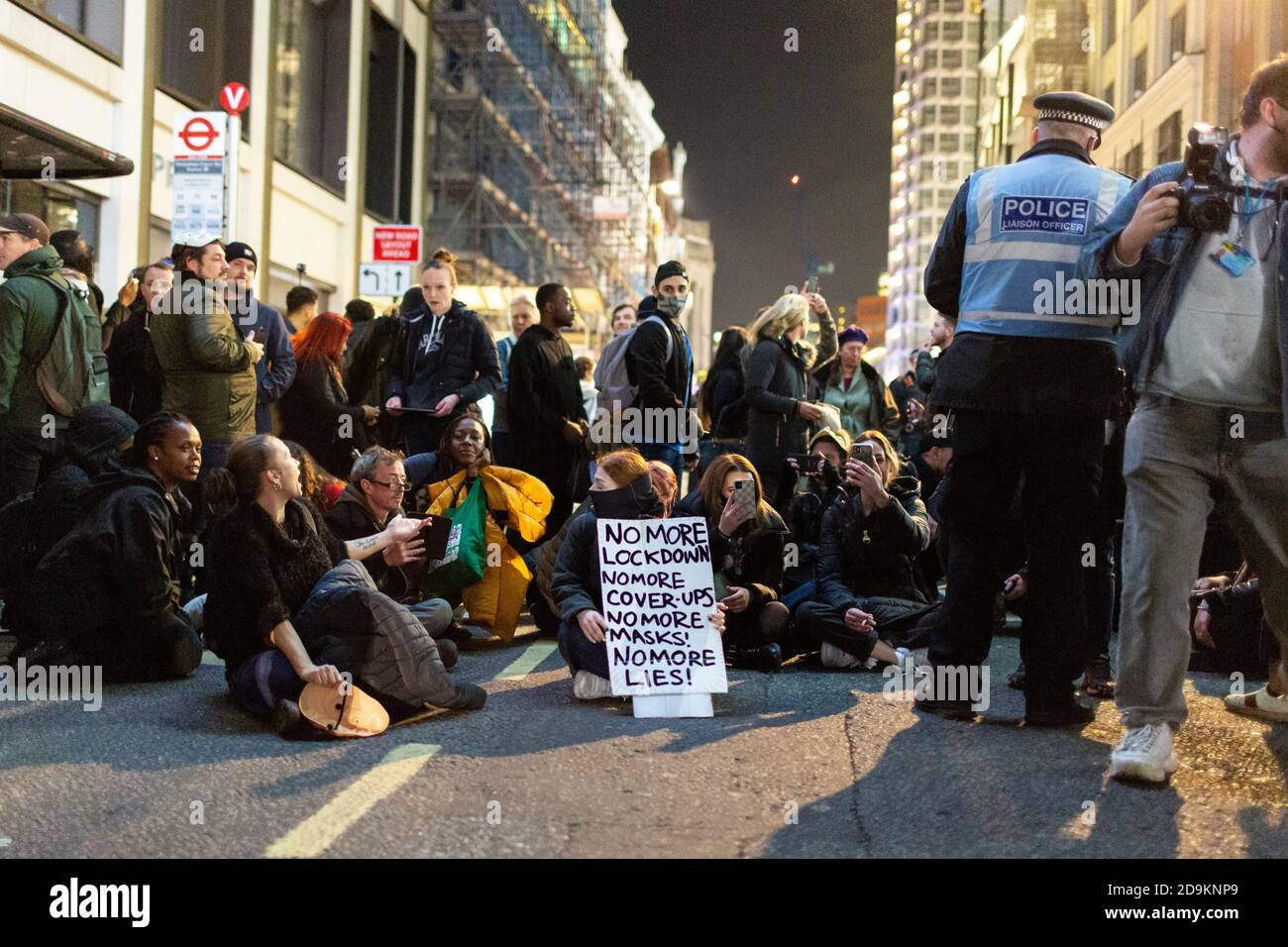 Protesters block a road during the Million Mask March attended by many lockdown sceptics, Oxford Street, London, 5 November 2020 Stock Photo