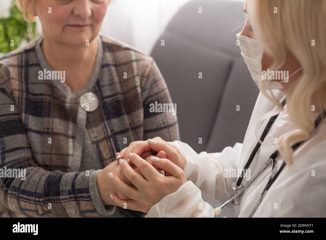 Old woman and the sweet young doctor Stock Photo - Alamy