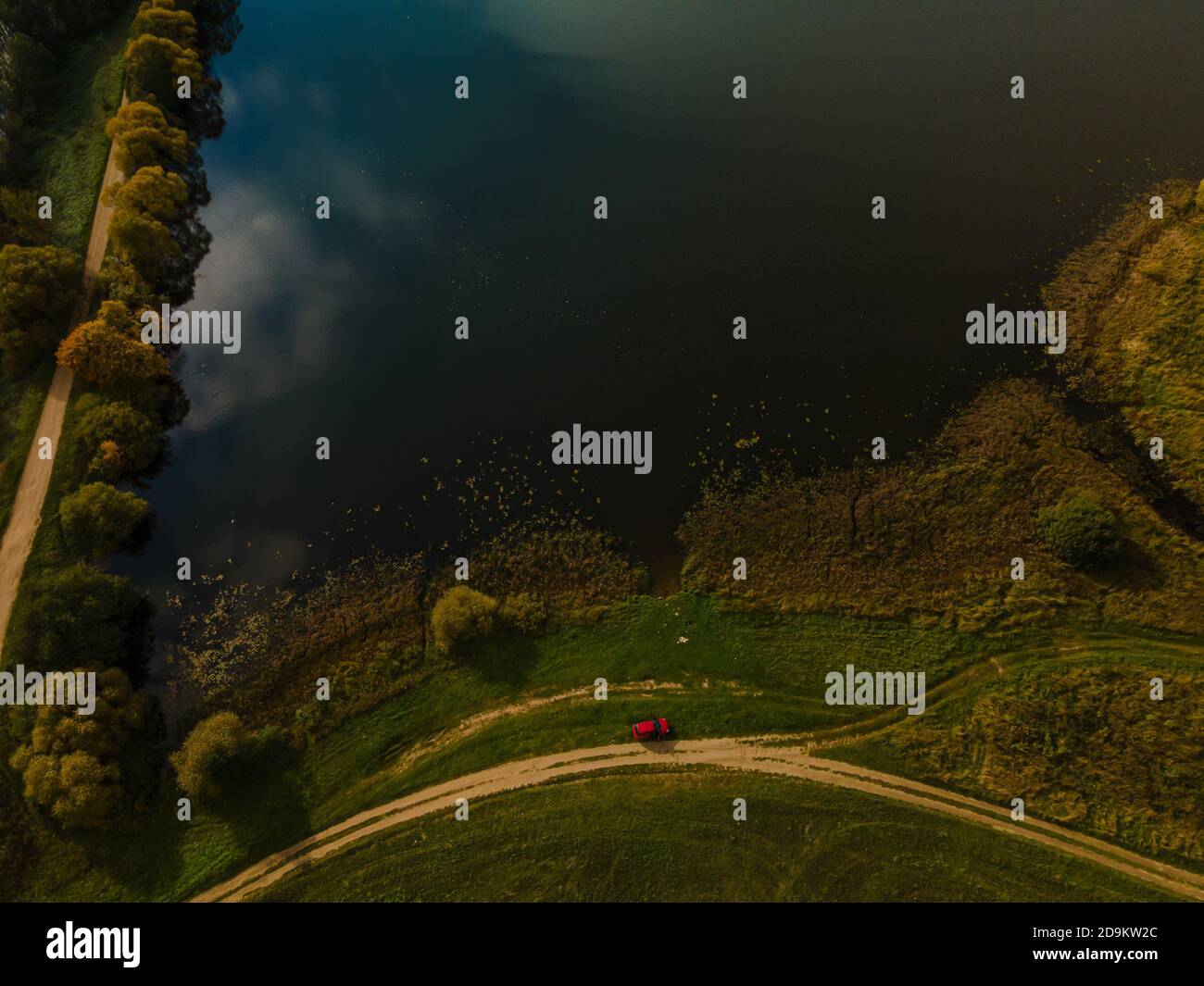 Landscape view from drone, yellow and green fields and haystacks, sky ...