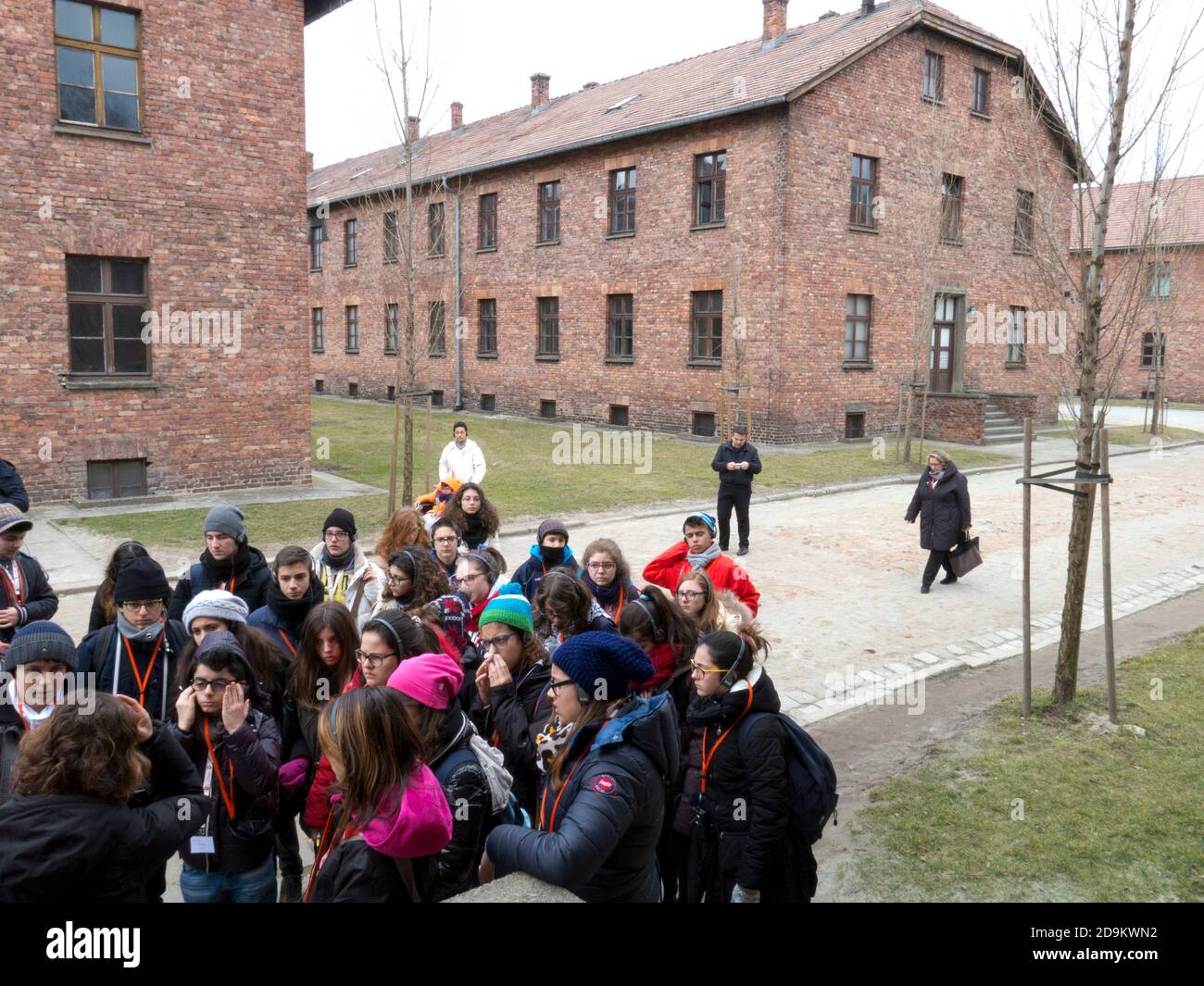 students visit Auschwitz-Birkenau concentration camp museum, Oswiecim, Poland Stock Photo