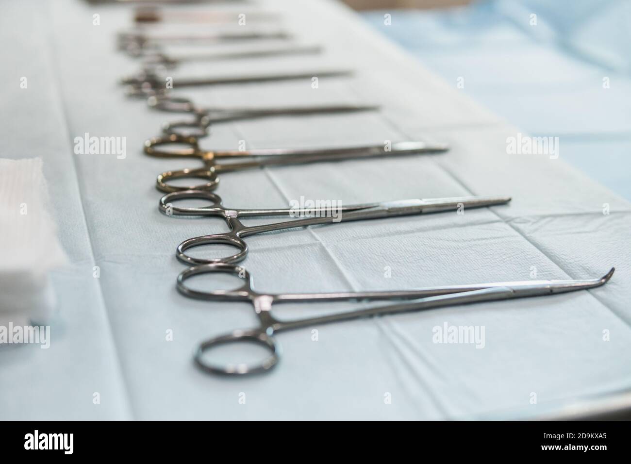 Surgery tools on a white table inside an operation room in a hospital