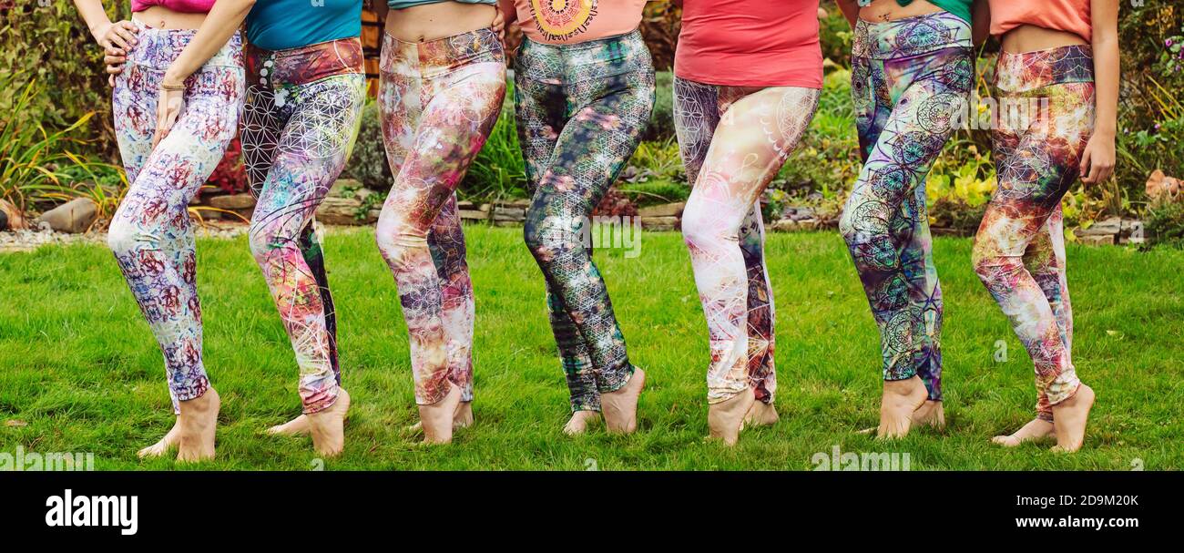 Female legs wearing colorful leggins outdoor barefoot Stock Photo - Alamy