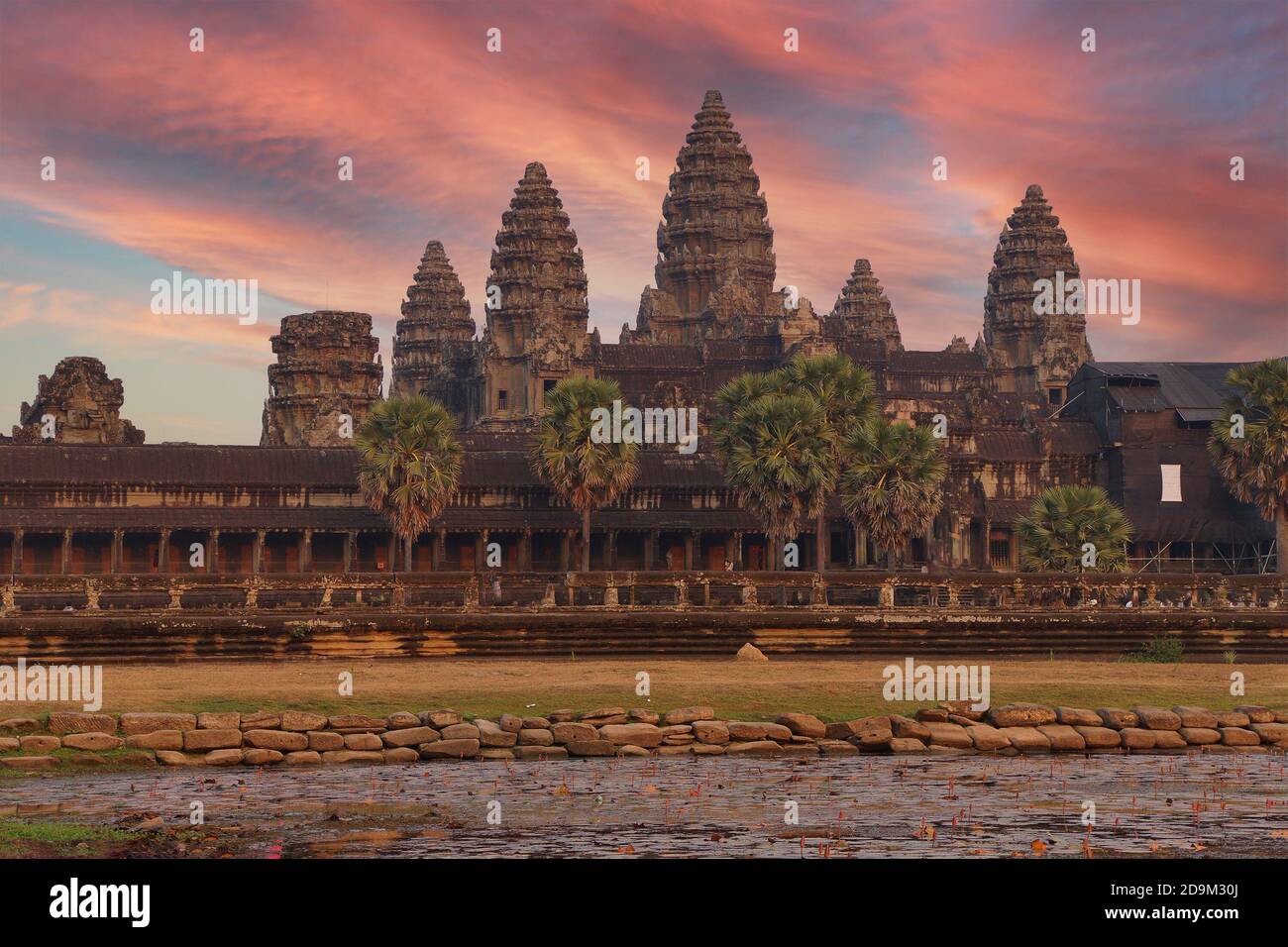 Sunset, central gopura towers and reflecting pool, Angkor Wat, Cambodia