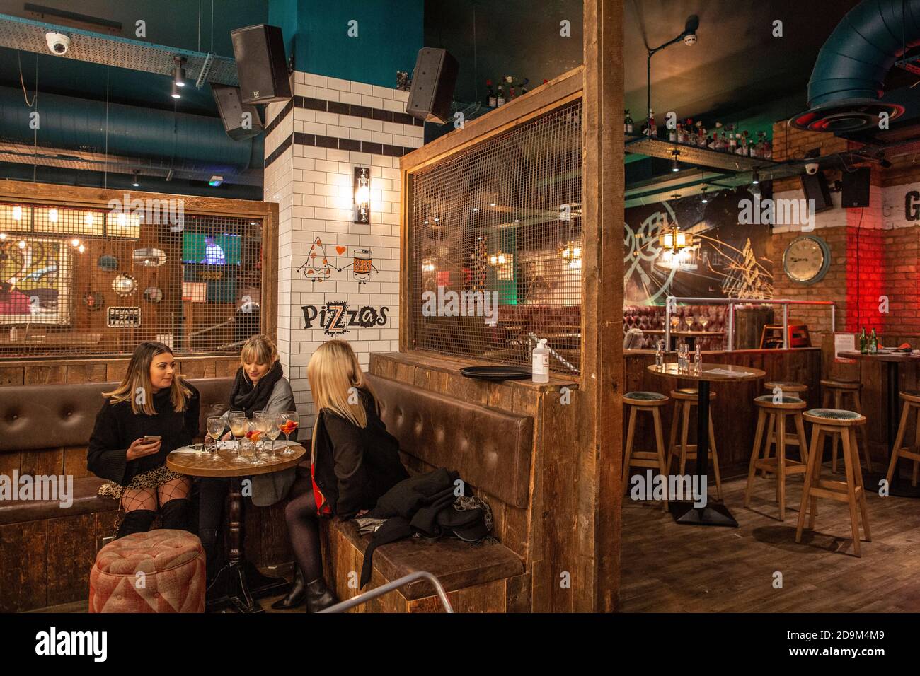 People out in Wimbledon town before the latest Coronavirus Lockdown restrictions came into force during November 2020 closing pubs and restaurants, UK Stock Photo