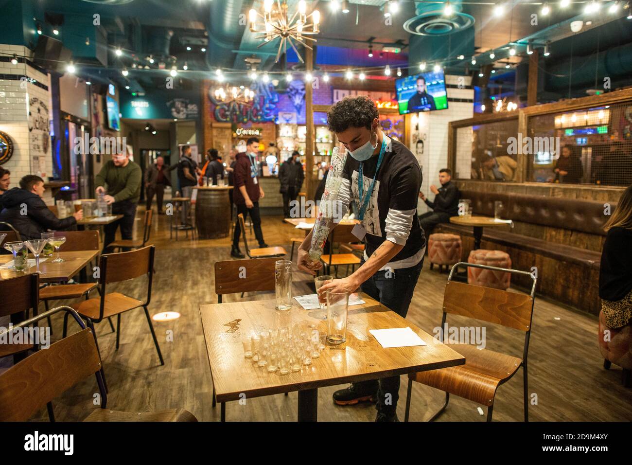 People out in Wimbledon town before the latest Coronavirus Lockdown restrictions came into force during November 2020 closing pubs and restaurants, UK Stock Photo