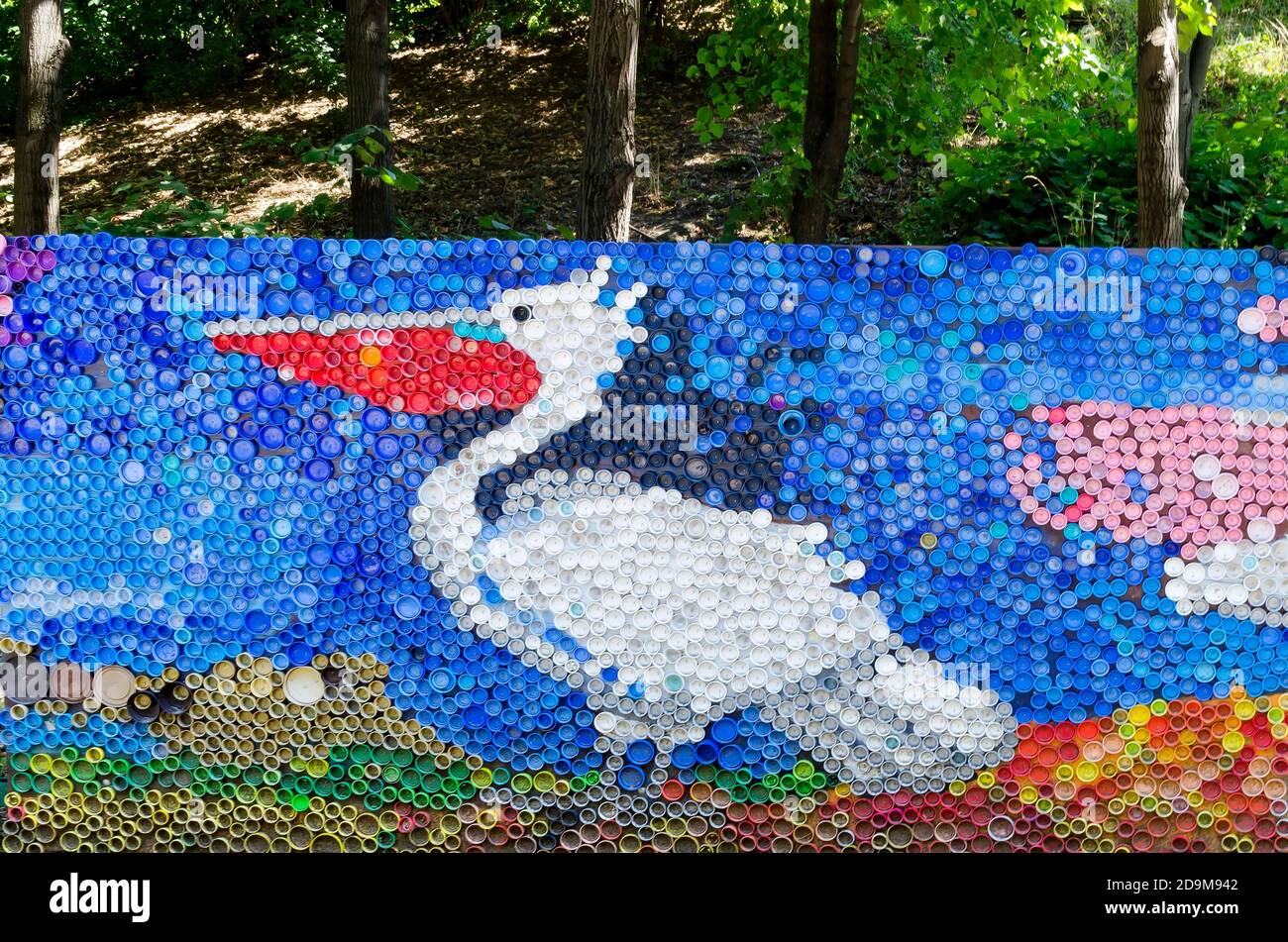 Mosaic with a dalmatian pelican or pelecanus crispus figure made of waste plastic caps, Sofia, Bulgaria Stock Photo