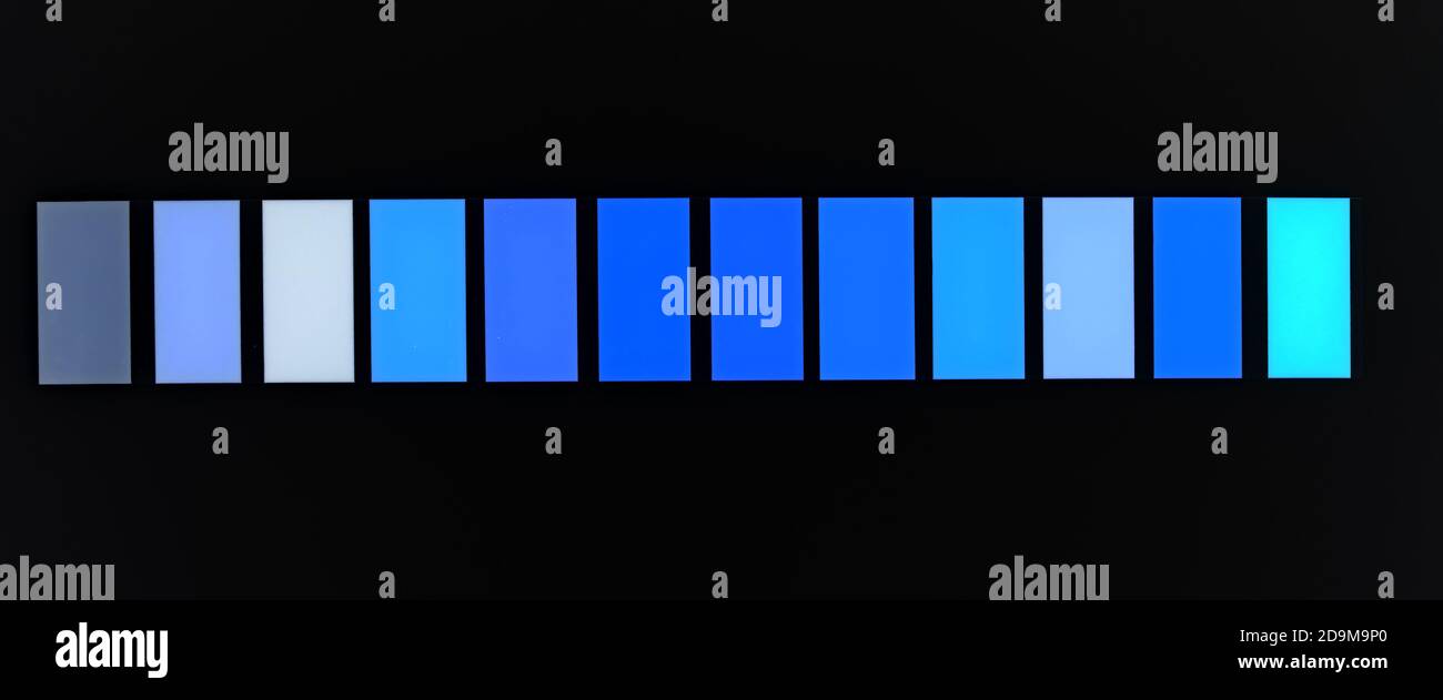 blue color palette samples on black background Stock Photo - Alamy