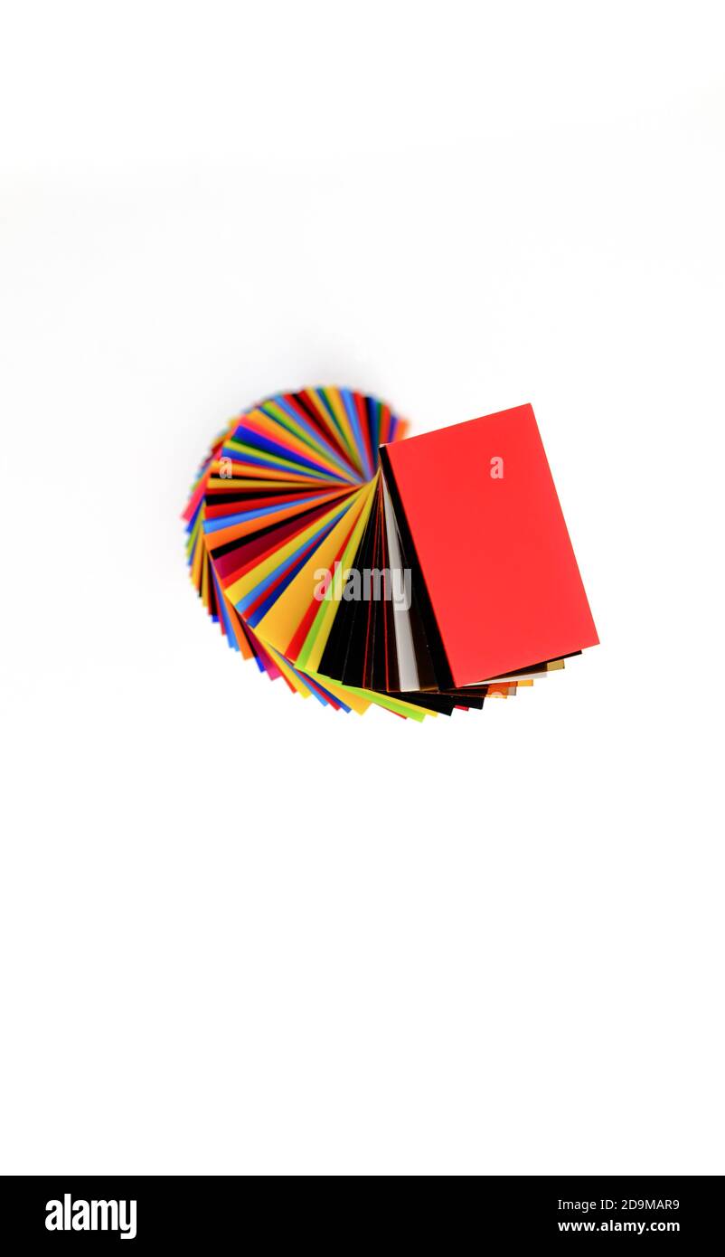 spiral Stack of different colours Cast Acrylic Sheet on white ...
