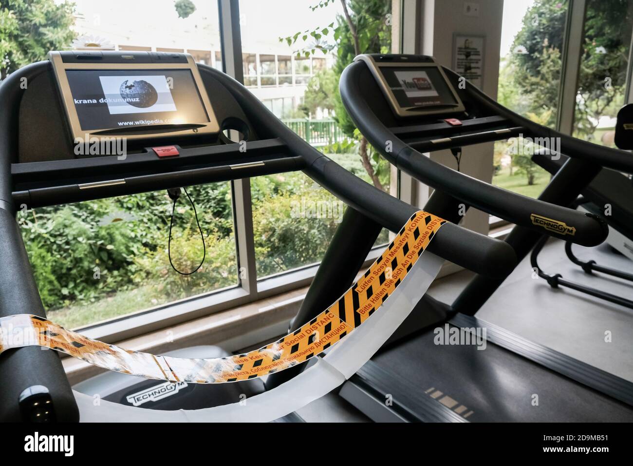 Belek, Turkey - October 2020: Safety measures to prevent coronavirus  spreading. Yellow tape on a restricted treadmill for social distancing  Stock Photo - Alamy