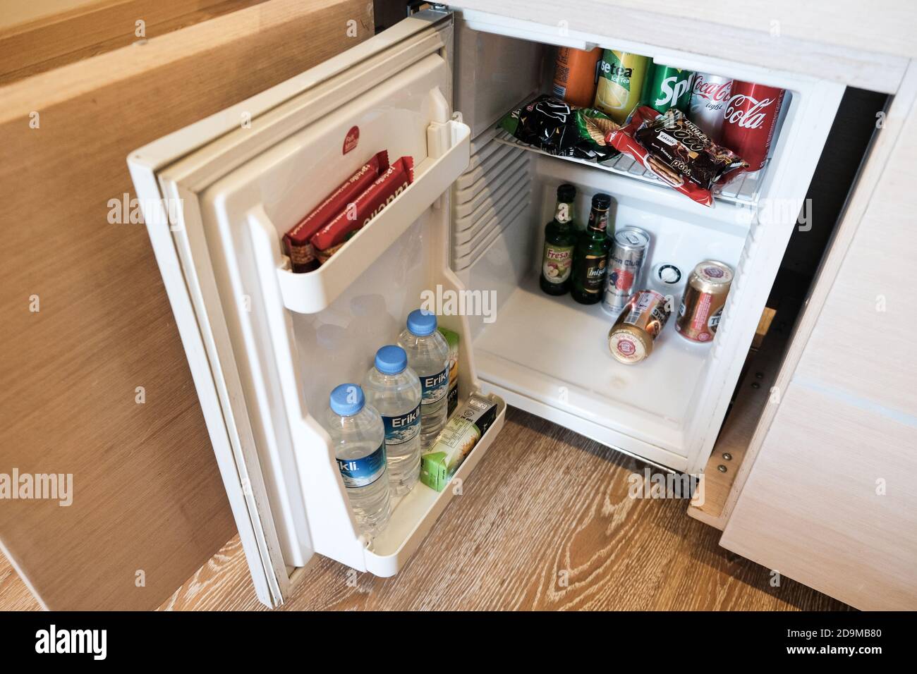 Belek, Turkey - October 2020: Free stuff in a mini bar in all-inclusive hotel in Antalya. Small fridge with treats for tourists and guests Stock Photo