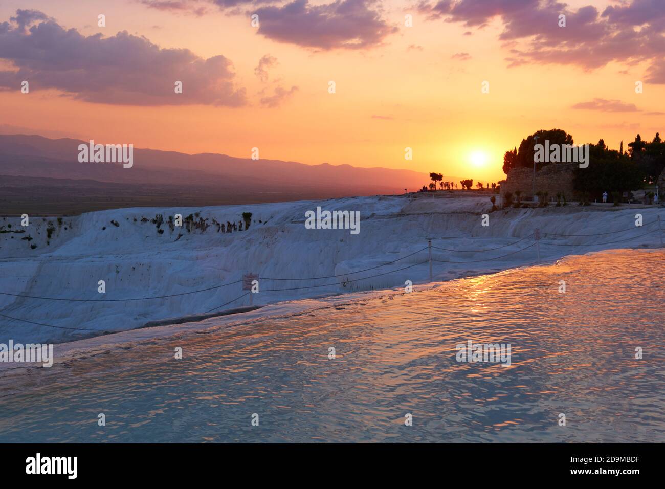 Pamukkale travertine at sunset, Turkey Stock Photo