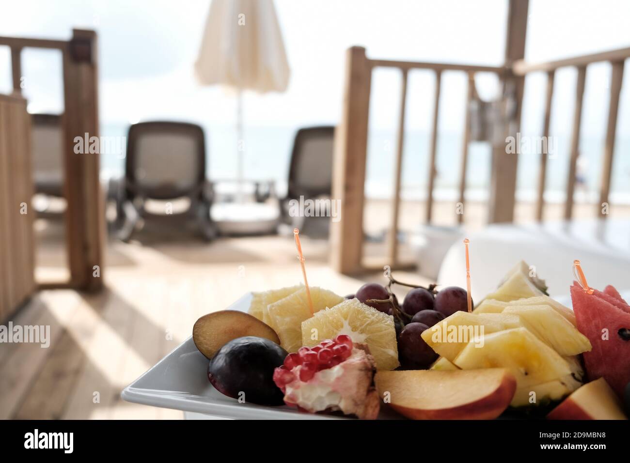 Delicious fruit plate served in a vip lounge of luxury resort. Traveling to remote island for weekend retreat. Selection of tropical fruits Stock Photo
