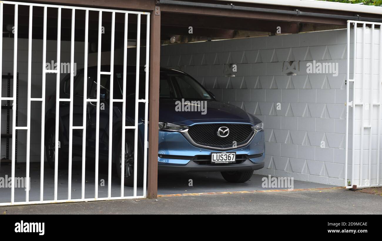 AUCKLAND, NEW ZEALAND - Nov 04, 2020: View of Mazda car in half open garag  Stock Photo - Alamy