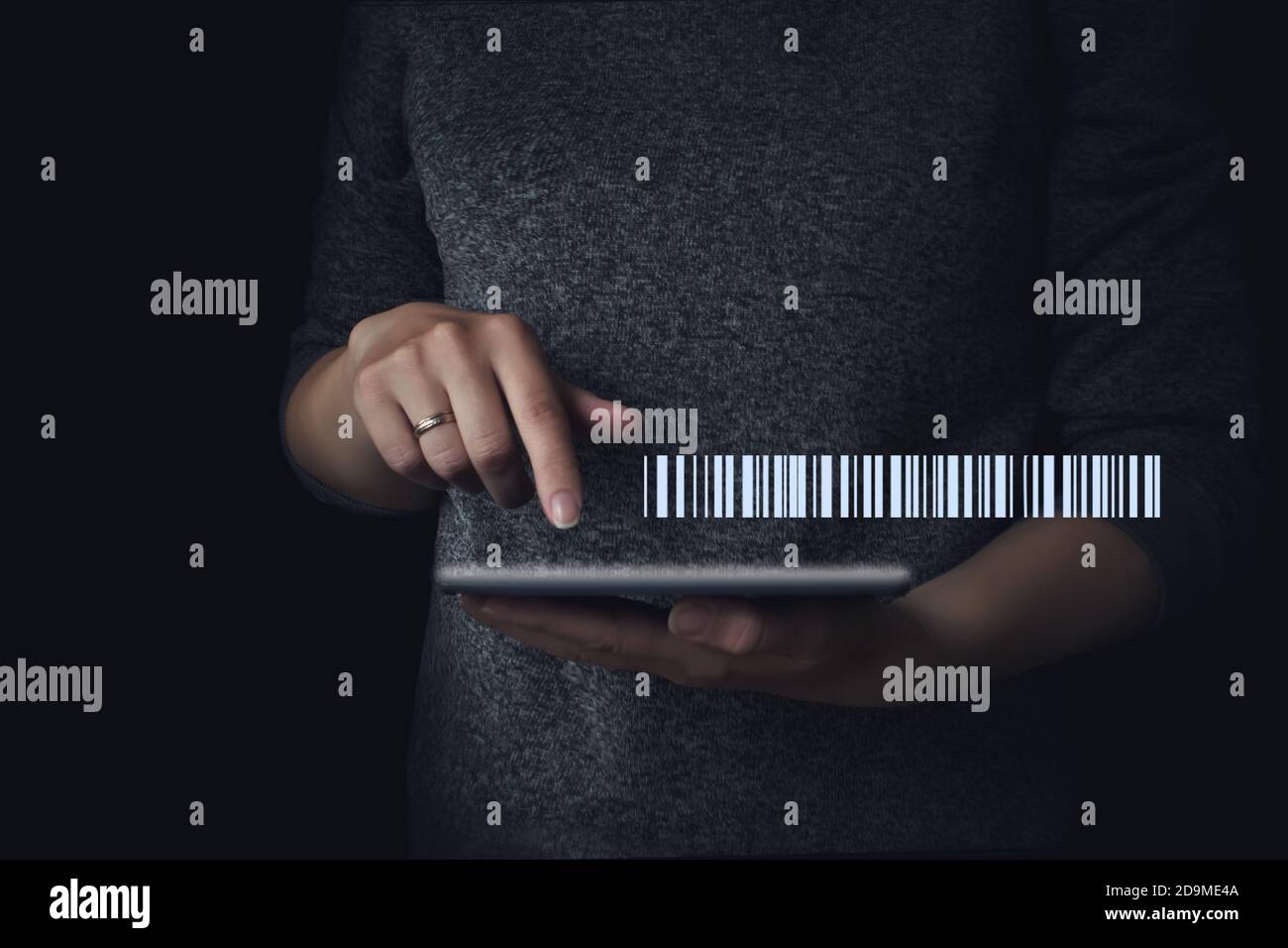 Gologram of modern tag barcode technology on hand to scan by personal tablet, easy simple method to pay or transfer by digital money, marketing intern Stock Photo