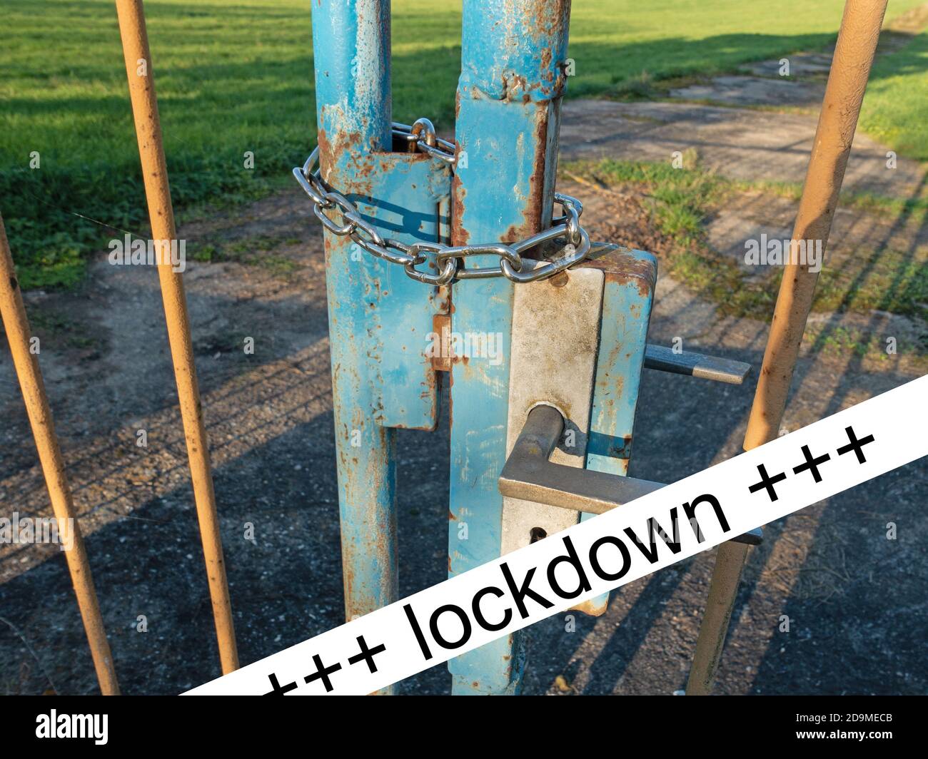 Gate locked with a chain, lockdown Stock Photo Alamy