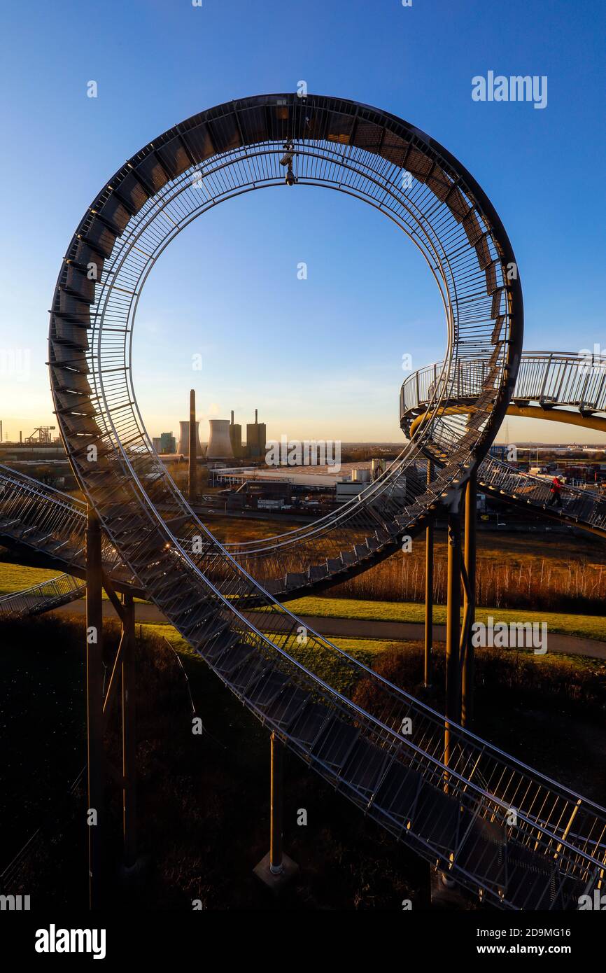 Tiger and Turtle, Magic Mountain is a landmark modeled on a roller coaster, the large sculpture is an accessible work of art by Heike Mutter and Ulrich Genth, which was developed as part of the Ruhr 2010 Capital of Culture, behind the HKM Hüttenwerke Krupp Mannesmann and RWE Power AG, Duisburg, Ruhr area, North Rhine-Westphalia, Germany Stock Photo