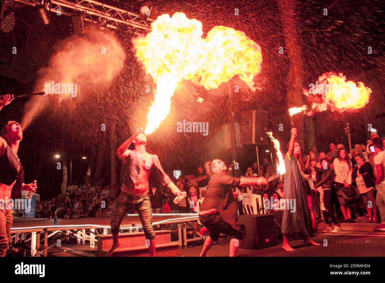LOREO, ITALY 24 MARCH 2020: Fire eaters They perform a show to the public Stock Photo