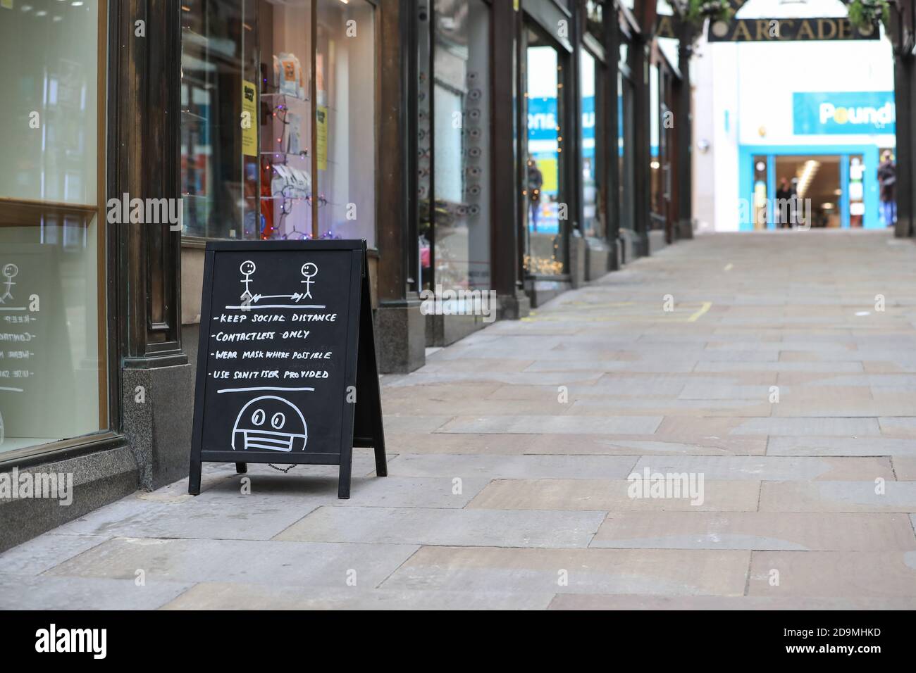 A social distance sign in the arcade during Covid-19 Day one of ...