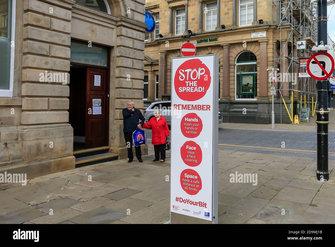 Stop the Spread sign outside of Barclays Bank and Lloyds Bank in