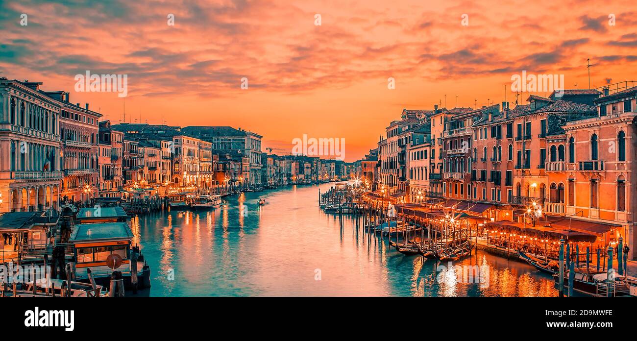 Famous grand canal from Rialto Bridge at blue hour, Venice, Italy. Special photographic processing. Stock Photo