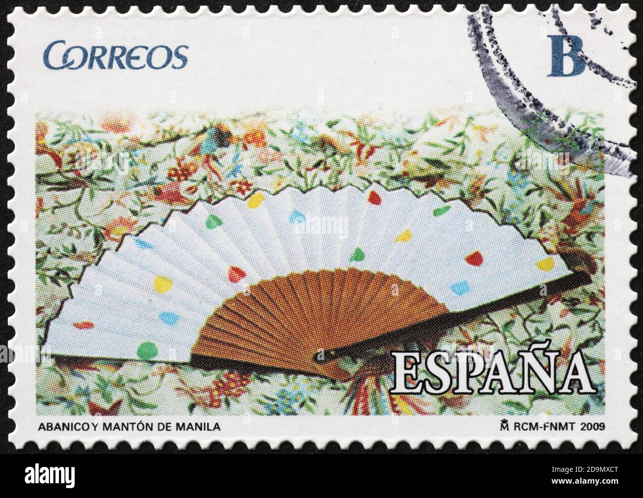 Traditional spanish fan on postage stamp Stock Photo