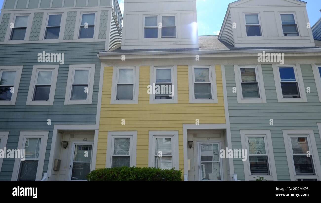 Boston, Massachusetts, New residential buildings, in desirable Waterfront District, with wooden siding and double insulated windows Stock Photo