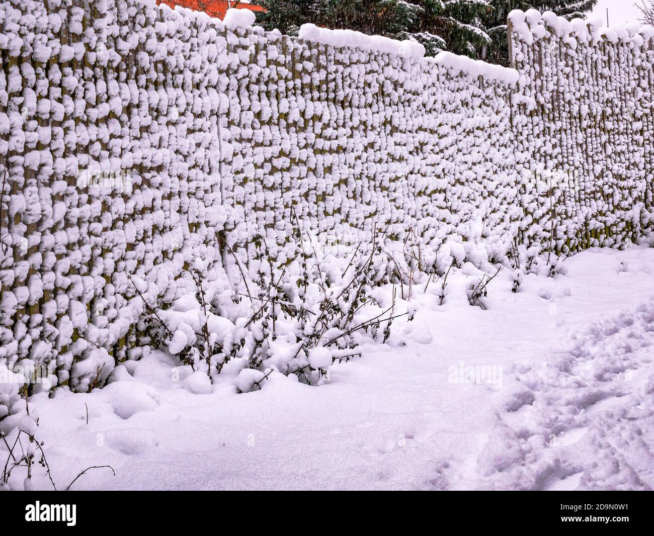 Fence covered with snow Stock Photo - Alamy