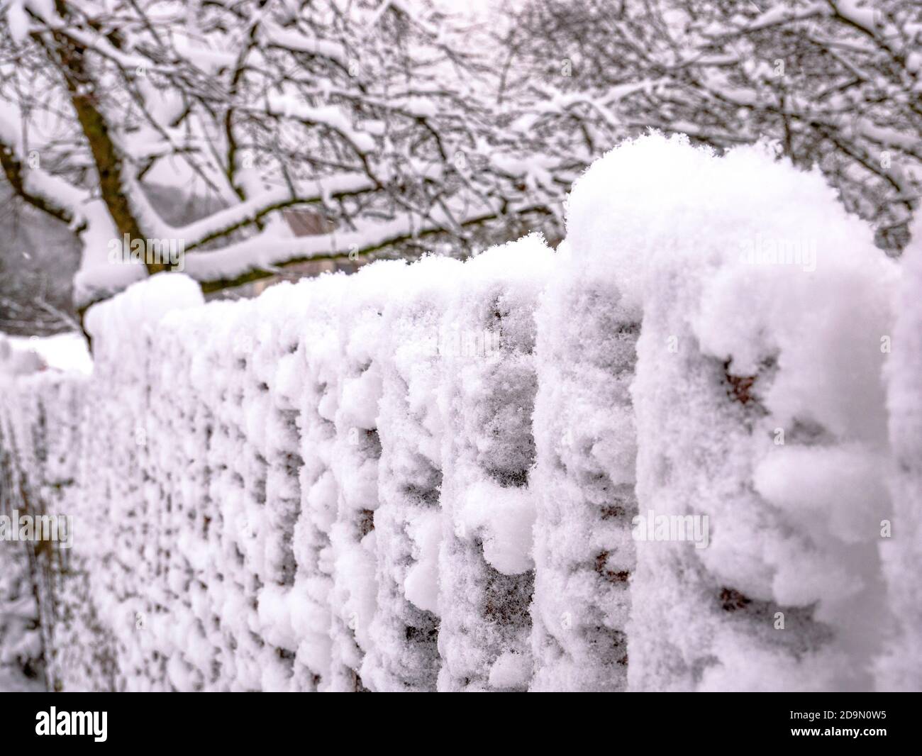 Wooden fence covered with snow - selective focus Stock Photo - Alamy