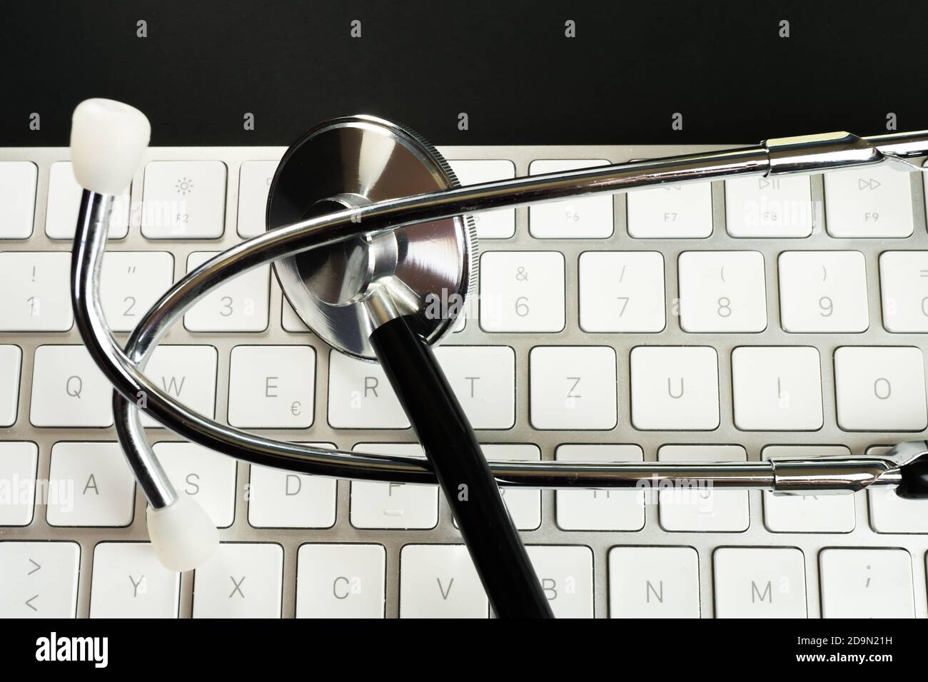 Stethoscope on a computer keyboard Stock Photo - Alamy