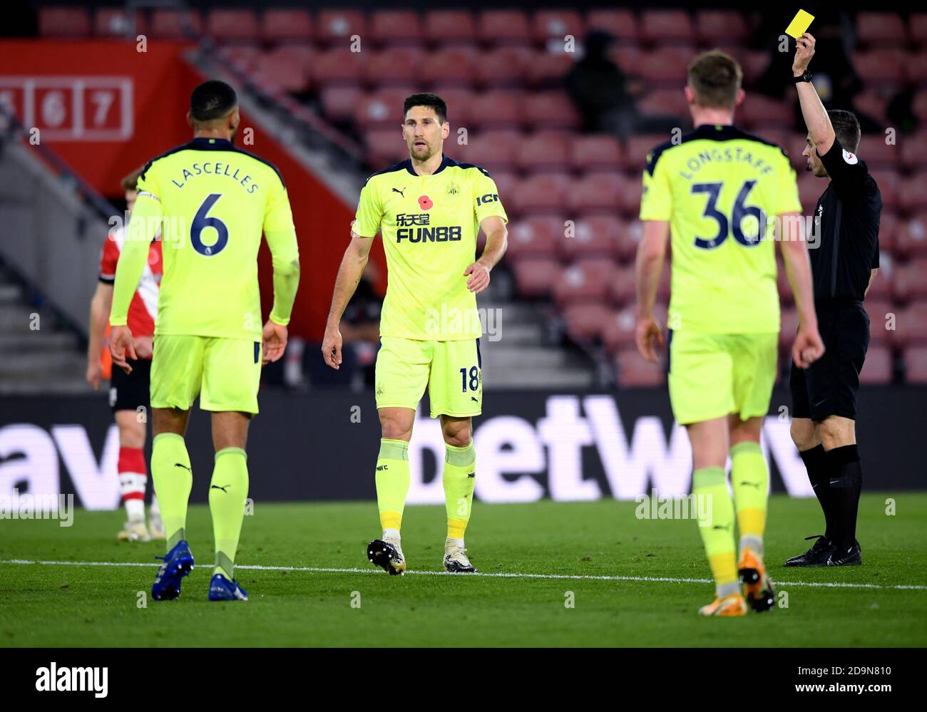 Newcastle United's Federico Fernandez (centre) receives a yellow card during the Premier League match at St Mary's Stadium, Southampton. Stock Photo