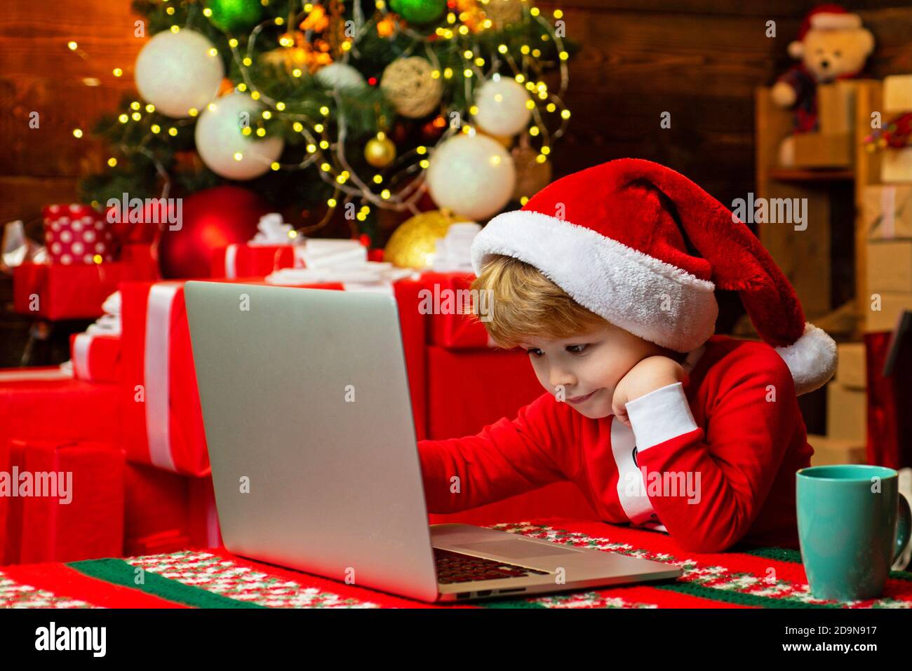 little helper. Little boy santa hat 