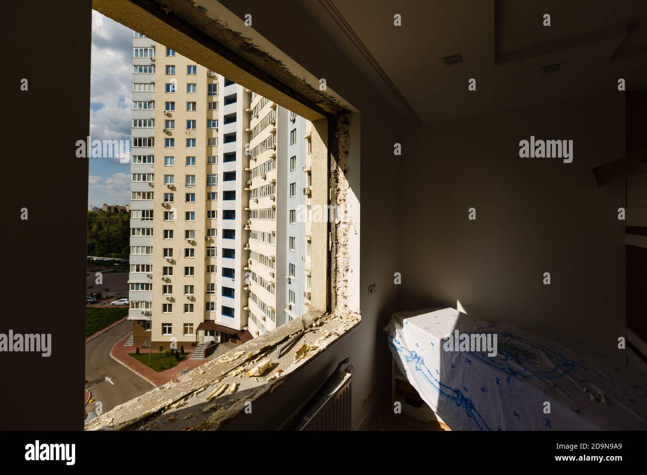 Process installation slopes of window. Using a moanting foam. Stock Photo