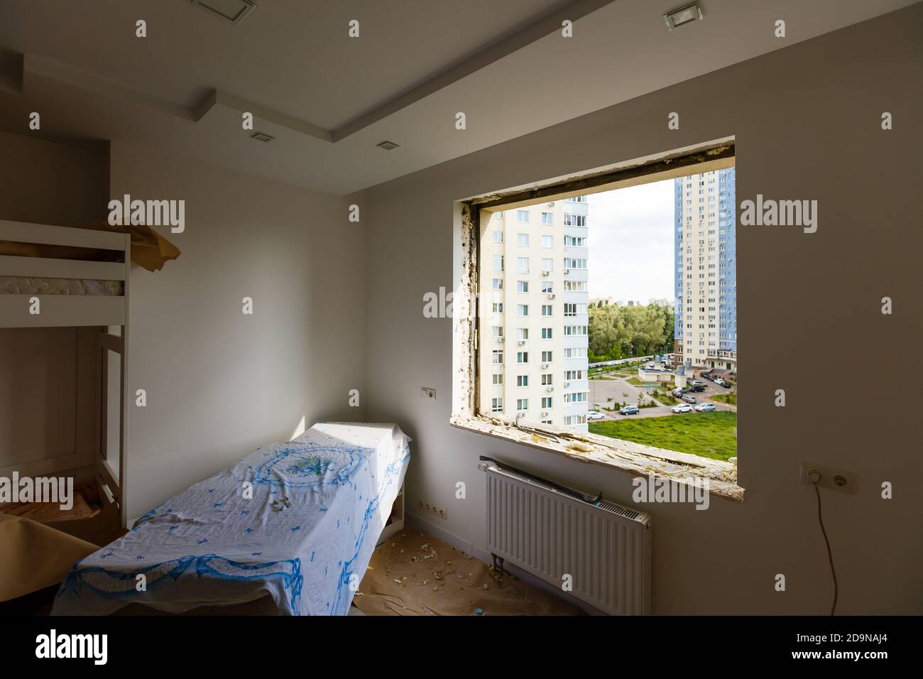 Process installation slopes of window. Using a moanting foam. Stock Photo