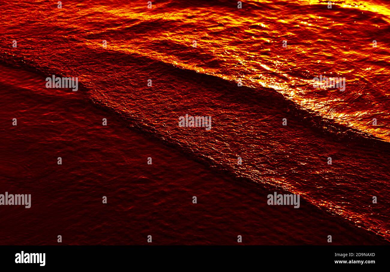 Natural background and glare on the surface of the sea. Small waves in ...