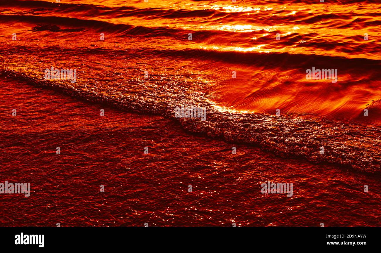 Natural background and glare on the surface of the sea. Small waves in ...