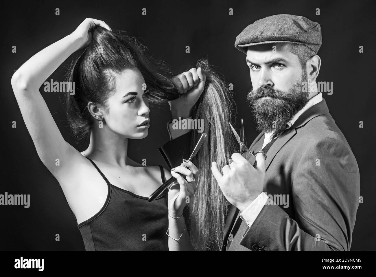 Barber shop design. Hair Stylist and Barber. Bearded man hipster wiht beauty woman. Fine Cuts. Portrait woman with long hair. Stock Photo