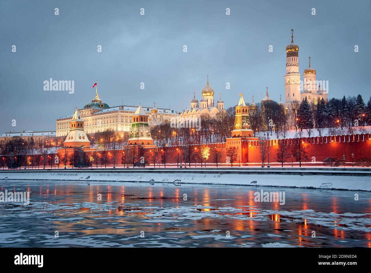 = Illuminated Moscow Kremlin in Winter Morning =  Beautiful architectural ensemble of Moscow Kremlin, the stronghold of the capital of Russia, illumin Stock Photo