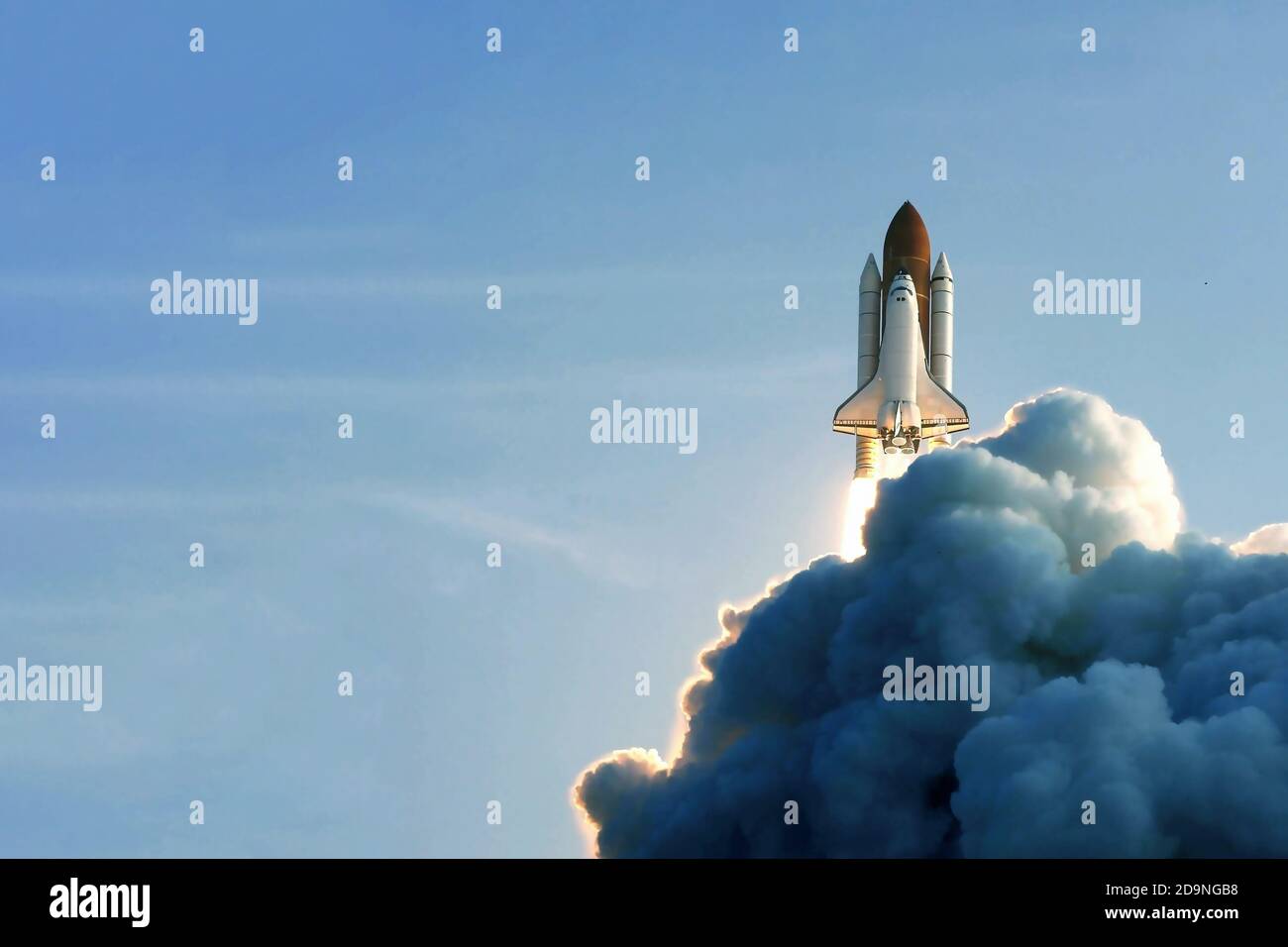 The launch of the space shuttle against the background of the sky and ...