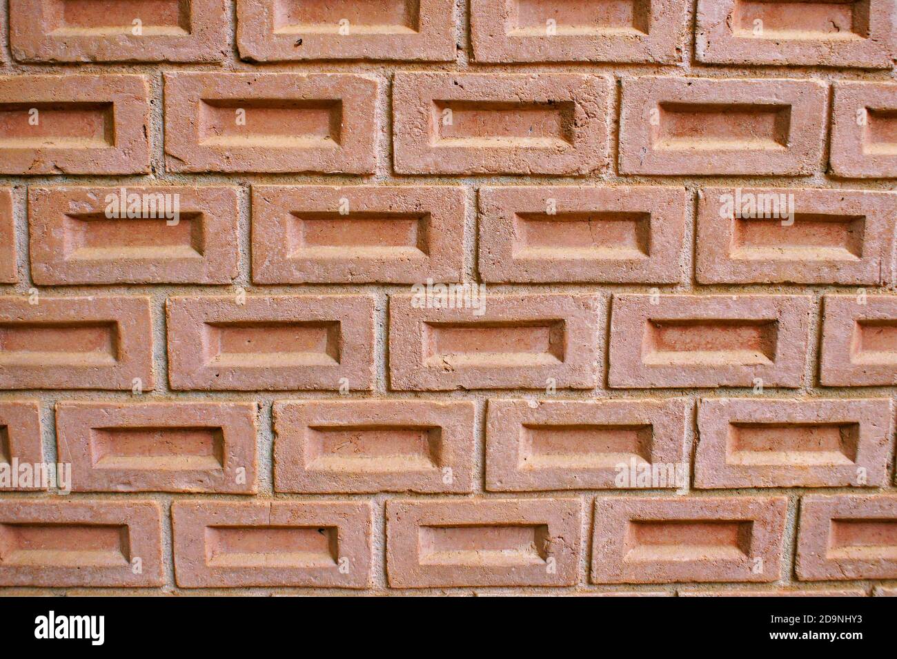 Brick wall background side view Stock Photo - Alamy