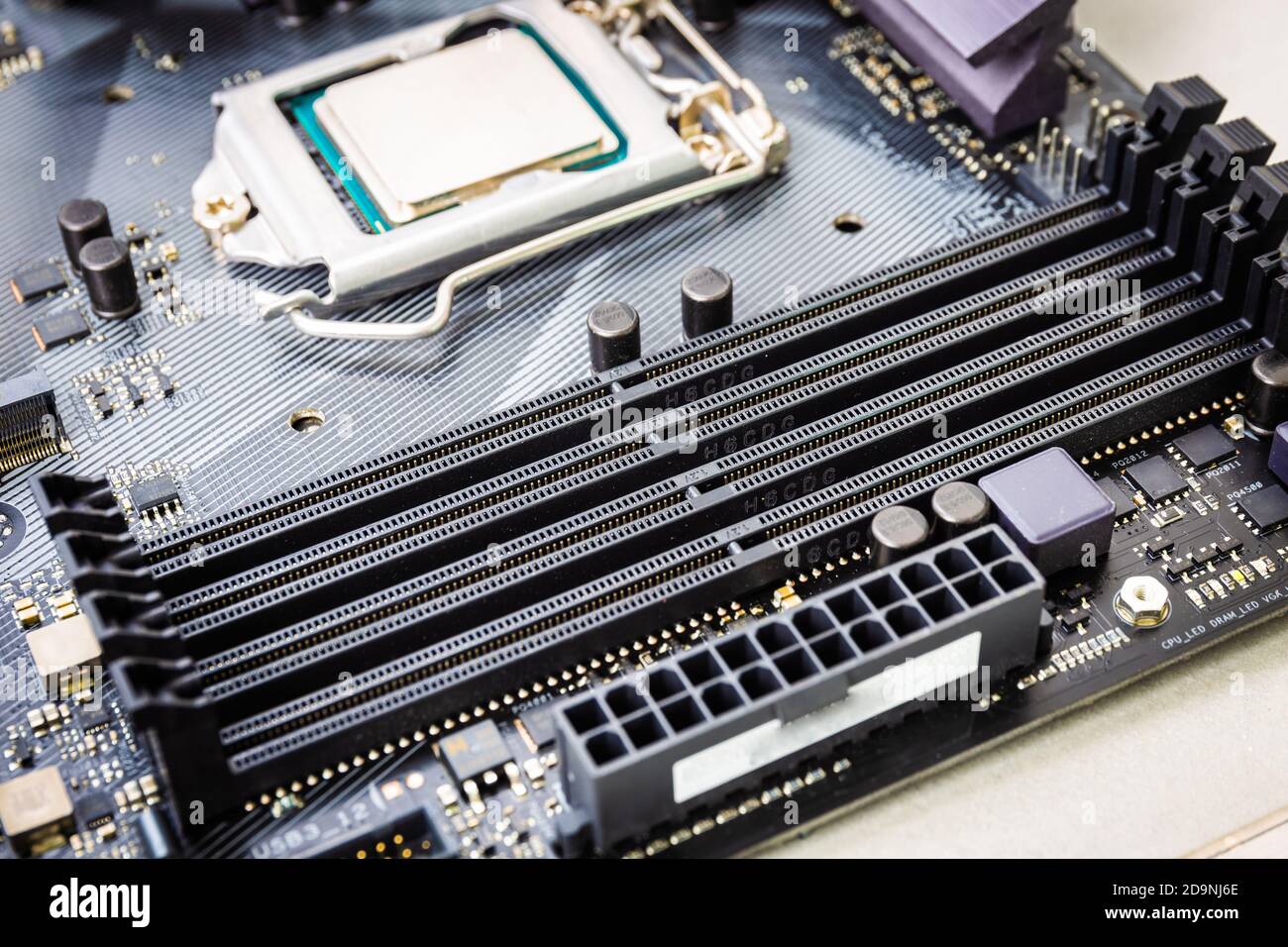 Closeup on empty RAM or random access memory slot on modern black motherboard Stock Photo