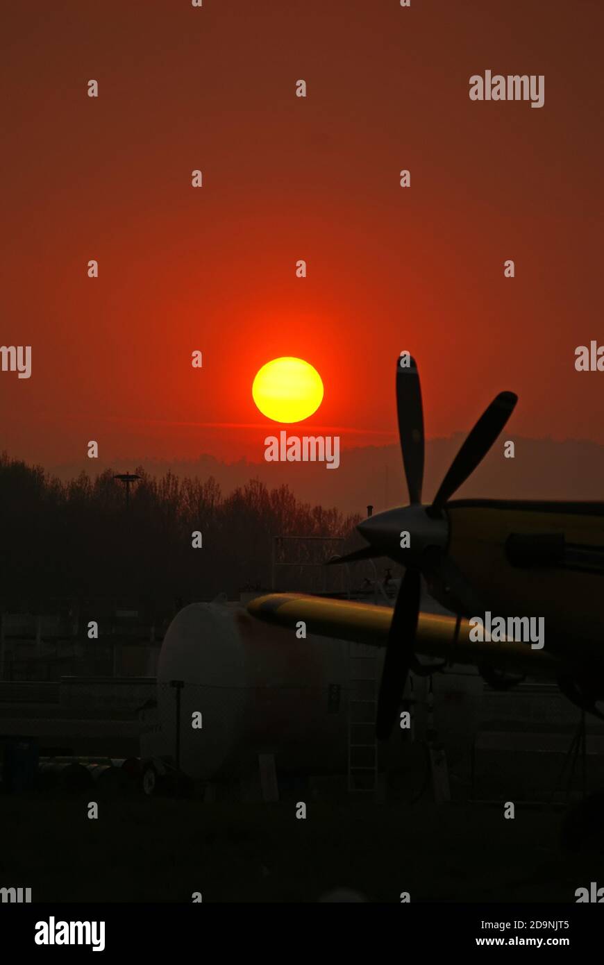 Skydiving plane sunset at the airfield Stock Photo