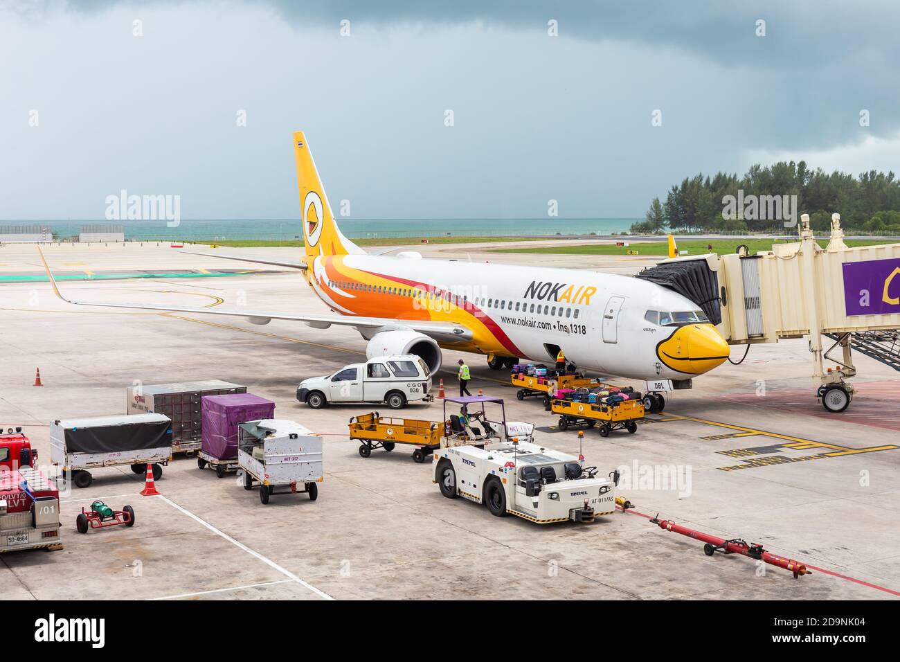 Phuket Thailand - May 29,2016 : The plane of Nok air that is parked on Phuket International Airport is waiting to transport people by weaving both dom Stock Photo