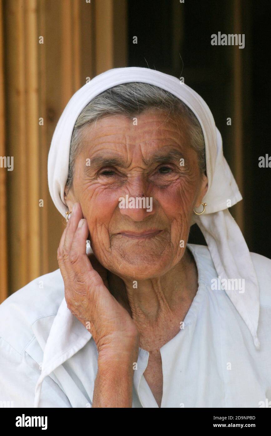 Smiling peasant woman hi-res stock photography and images - Alamy