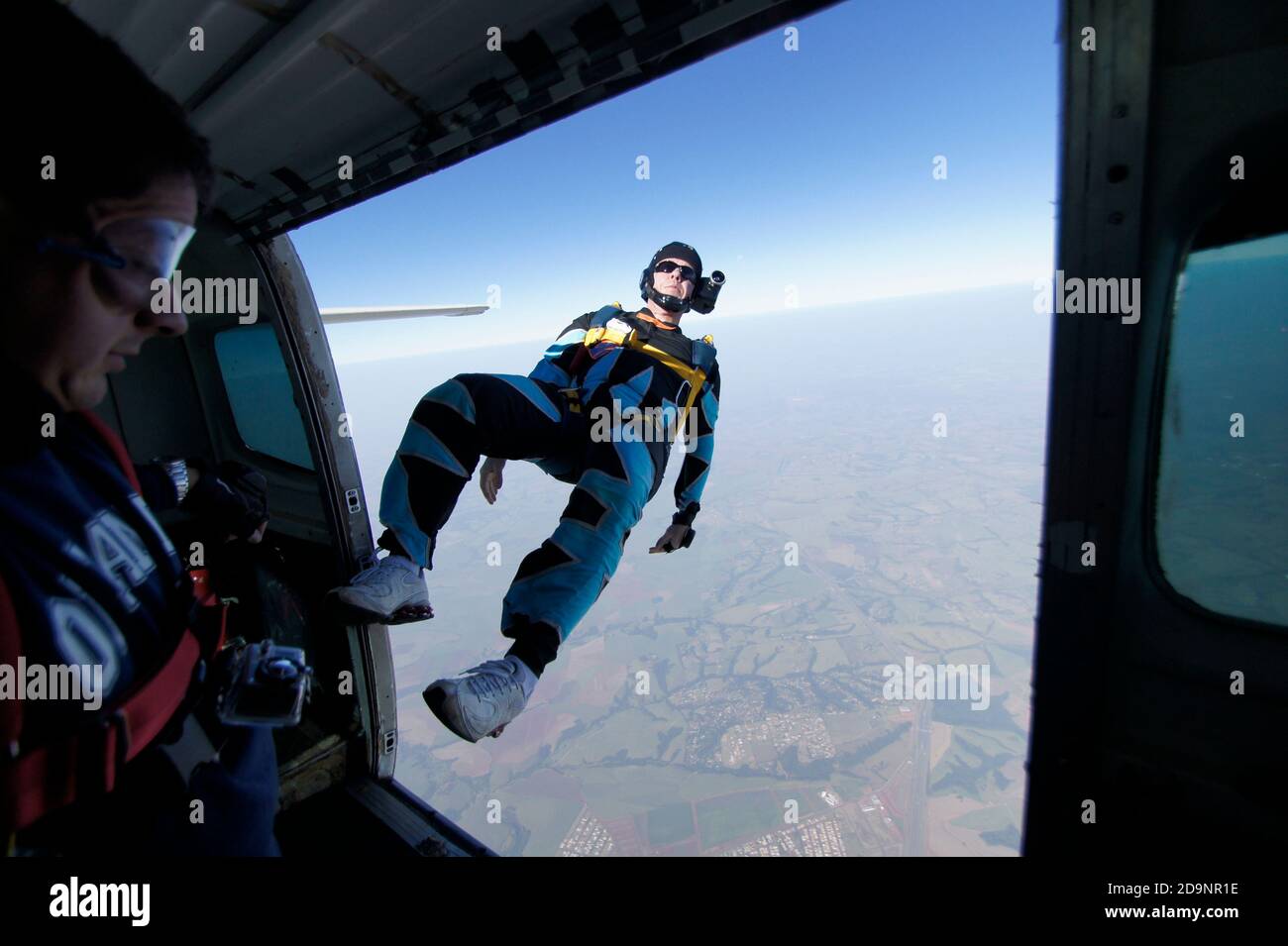 Skydivers jumping out the plane Stock Photo