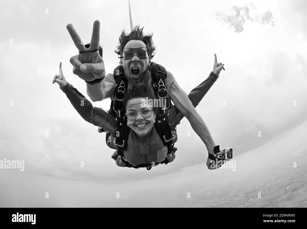 Skydive tandem jump extreme sports black and white Stock Photo