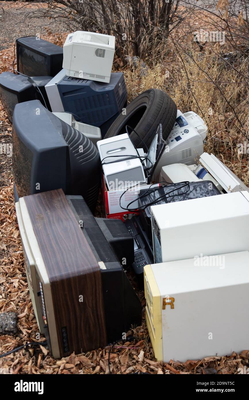 electronic recycling waste, pile of old tv, old computers, old technology waiting for recycle Stock Photo