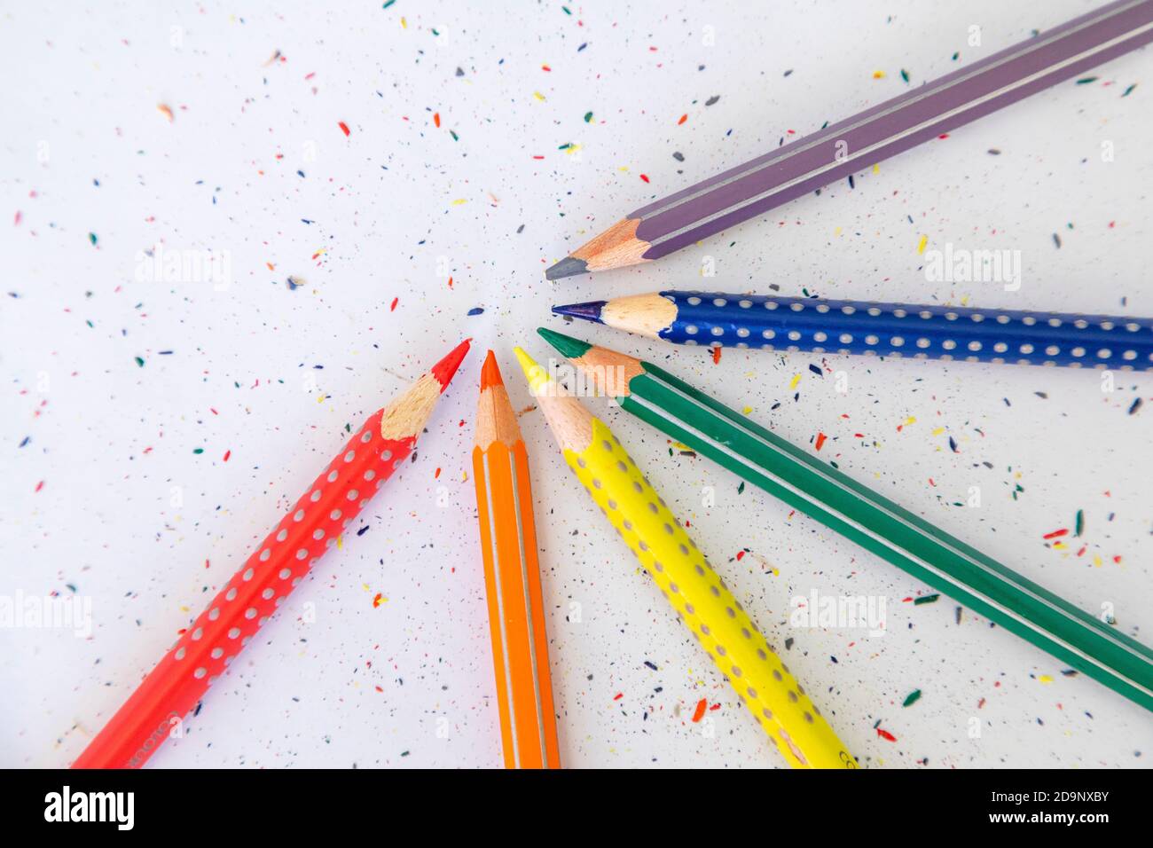 colorful pencils crayons on white table, rainbow colors, closeup Stock Photo