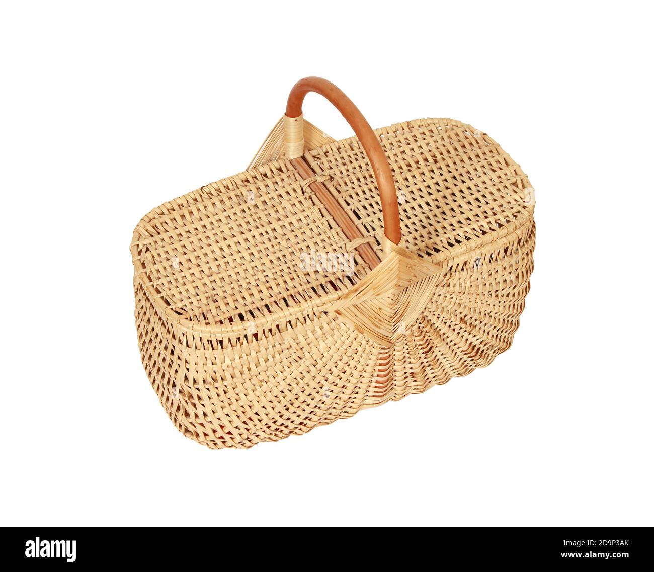A woven wicker basket with a handle and a lid isolated on a white ...