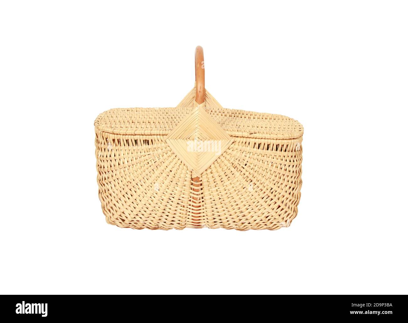 A woven wicker basket with a handle and a lid isolated on a white ...